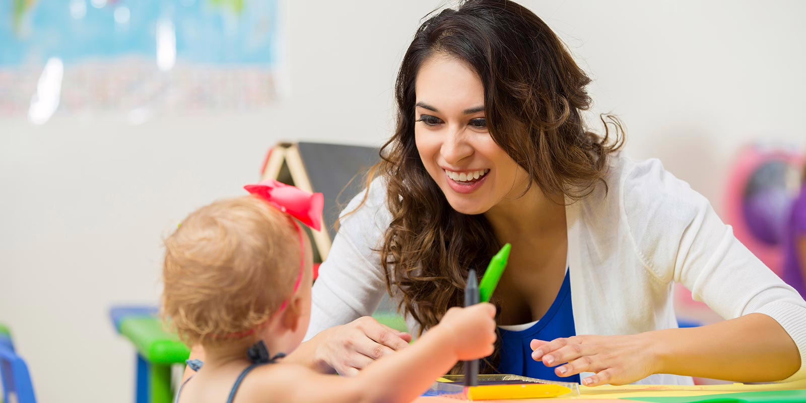 Young child with teacher