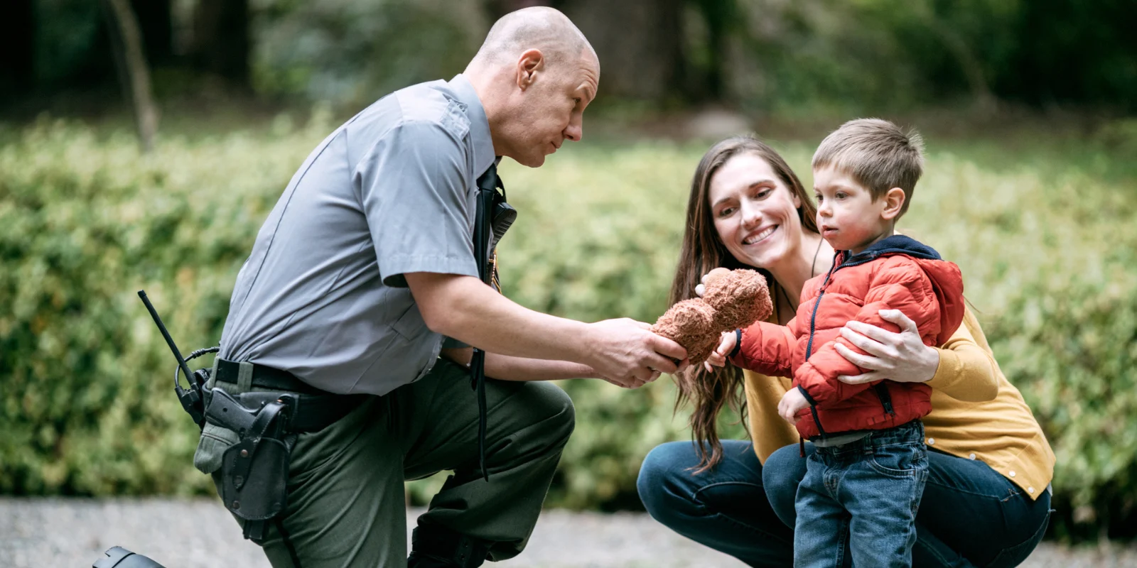 Officer with child and parent