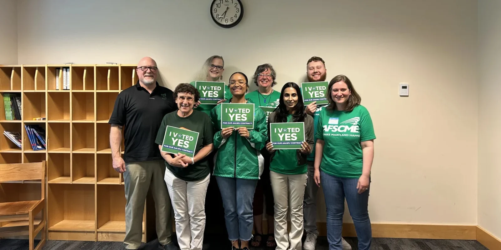 Library workers gathered after win