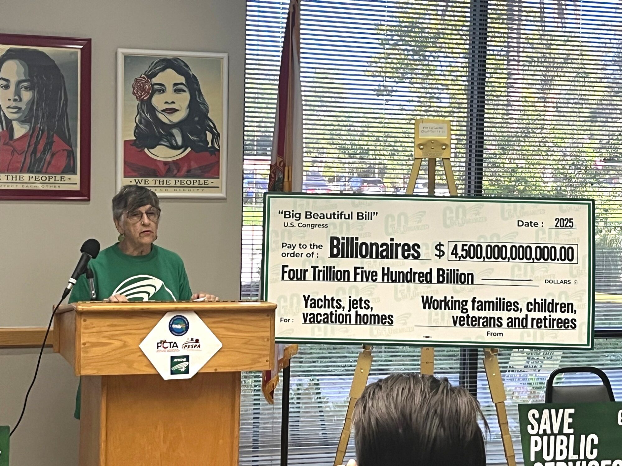 Member at podium speaking up