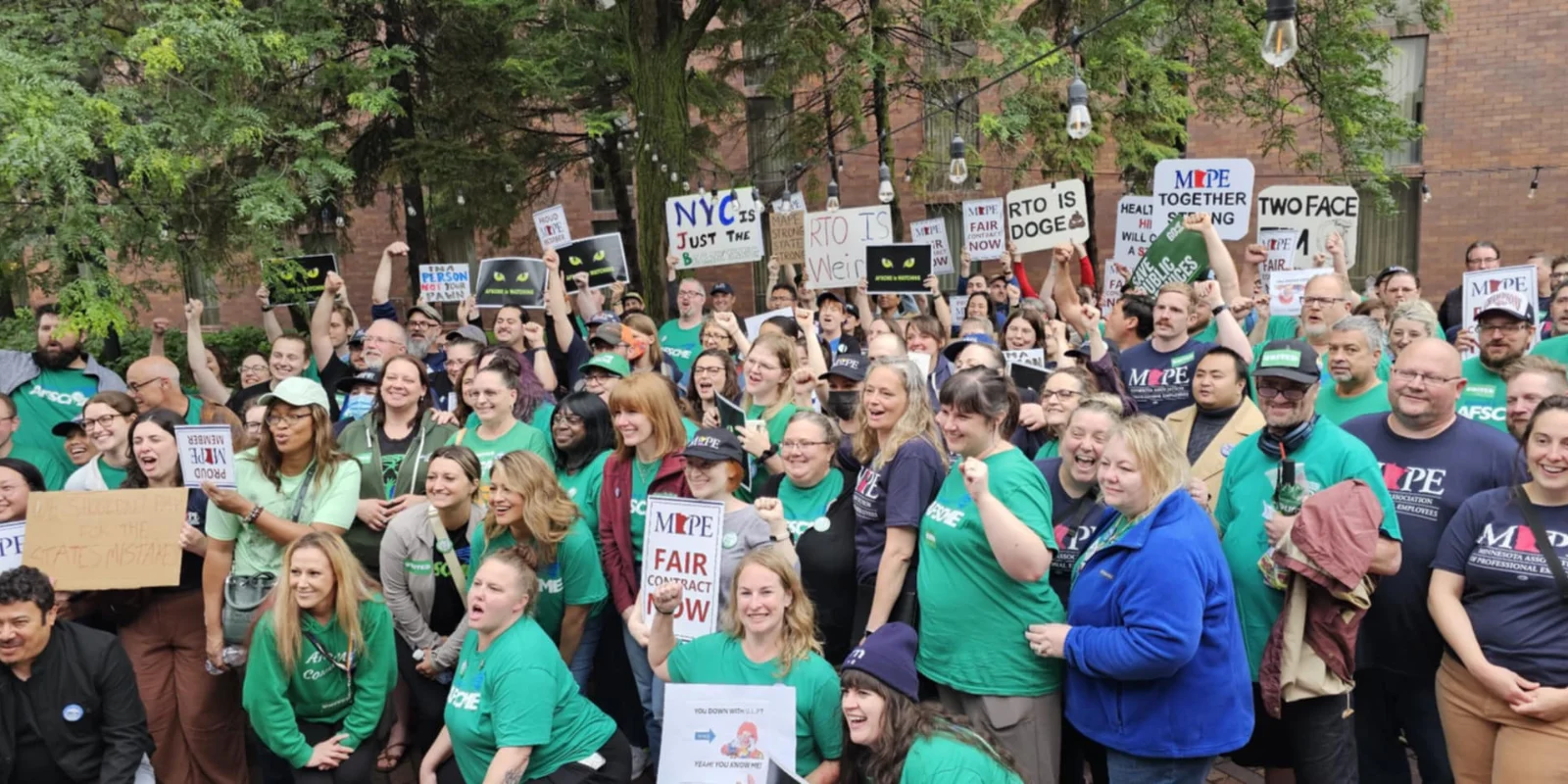 Minnesota members with signs